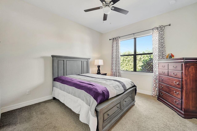 964 SW Canoe Creek Ter, Palm City, FL 34990 - bedroom with ceiling fan, light carpet, and baseboards