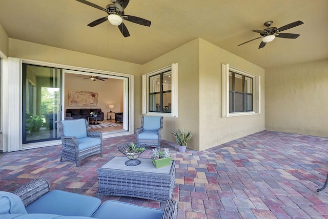 964 SW Canoe Creek Ter, Palm City, FL 34990 - view of patio / terrace with ceiling fan and an outdoor living space