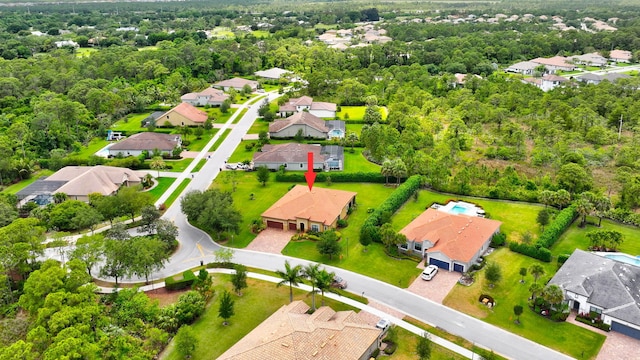 964 SW Canoe Creek Ter, Palm City, FL 34990 - birds eye view of property featuring a forest view and a residential view