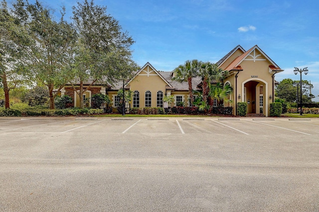 964 SW Canoe Creek Ter, Palm City, FL 34990 - view of building exterior with uncovered parking