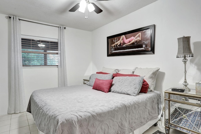 bedroom featuring tile patterned flooring and ceiling fan