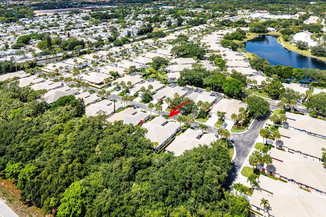 bird's eye view with a water view and a residential view