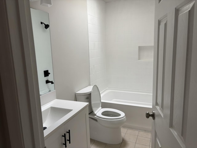 full bathroom featuring tile patterned flooring, toilet, vanity, and tub / shower combination