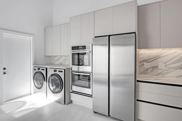 6560 Las Flores Dr, Boca Raton, FL 33433 - clothes washing area with separate washer and dryer