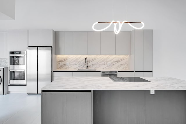 6560 Las Flores Dr, Boca Raton, FL 33433 - kitchen with appliances with stainless steel finishes, modern cabinets, a sink, and gray cabinetry
