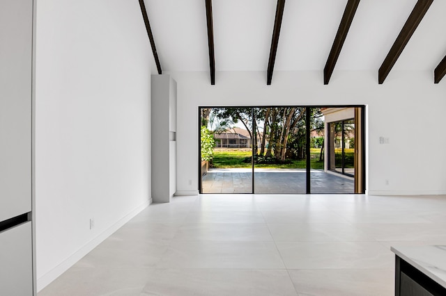 6560 Las Flores Dr, Boca Raton, FL 33433 - tiled spare room featuring baseboards