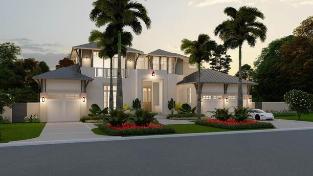 1105 Harbor Dr, Delray Beach, FL 33483 - view of front of home featuring a garage, a balcony, driveway, and stucco siding