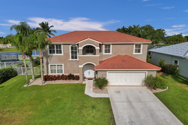 view of front of home with a garage, stucco siding, a tile roof, fence, and driveway