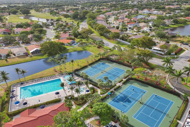 bird's eye view with a water view and a residential view