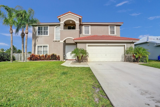 mediterranean / spanish house with fence, stucco siding, a tiled roof, and driveway