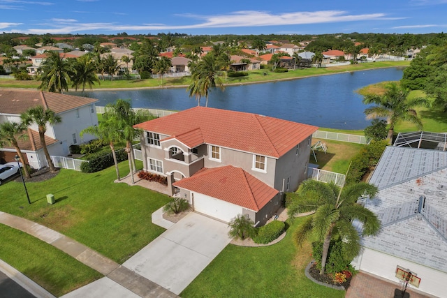 aerial view with a water view and a residential view