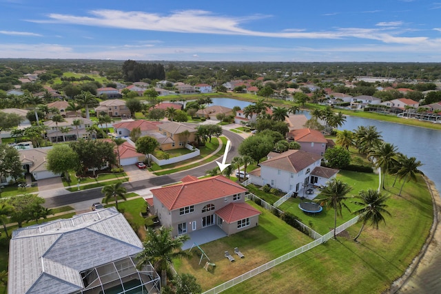 aerial view with a water view and a residential view