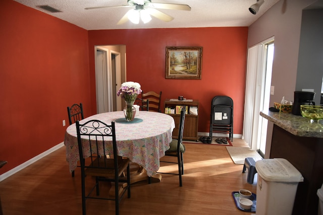 9170 NW 21st Mnr, Sunrise, FL 33322 - dining area featuring ceiling fan and light wood-type flooring