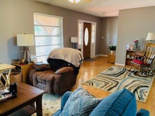 9170 NW 21st Mnr, Sunrise, FL 33322 - living area featuring wood finished floors and ceiling fan