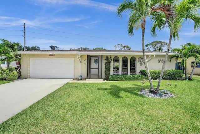 ranch-style home with stucco siding, an attached garage, concrete driveway, and a front lawn