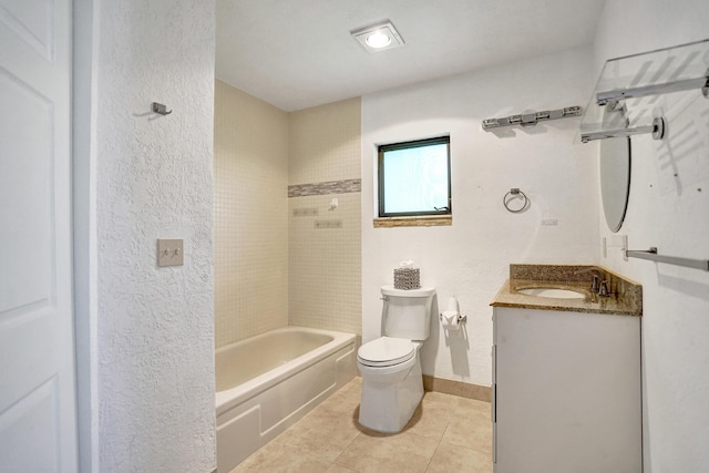 full bathroom with toilet, tile patterned flooring, vanity, a textured wall, and baseboards