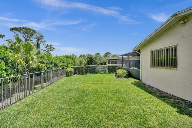 view of yard featuring a sunroom