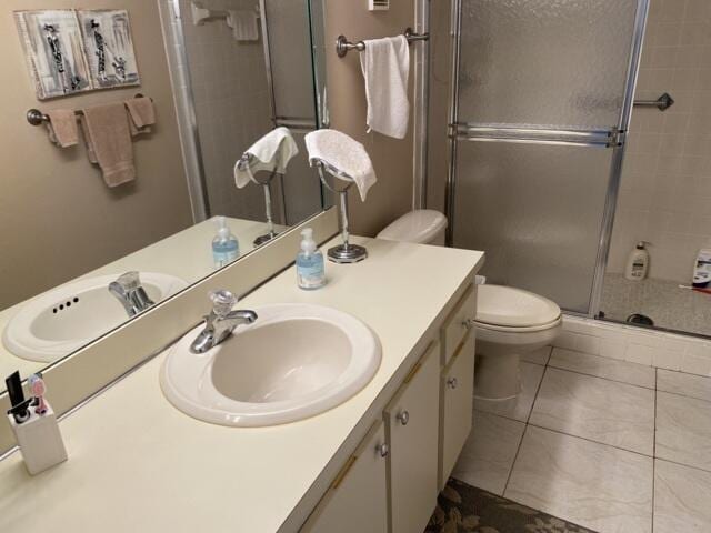 7076 Huntington Ln Unit 805, Delray Beach, FL 33446 - full bath with tile patterned floors, vanity, toilet, and a stall shower