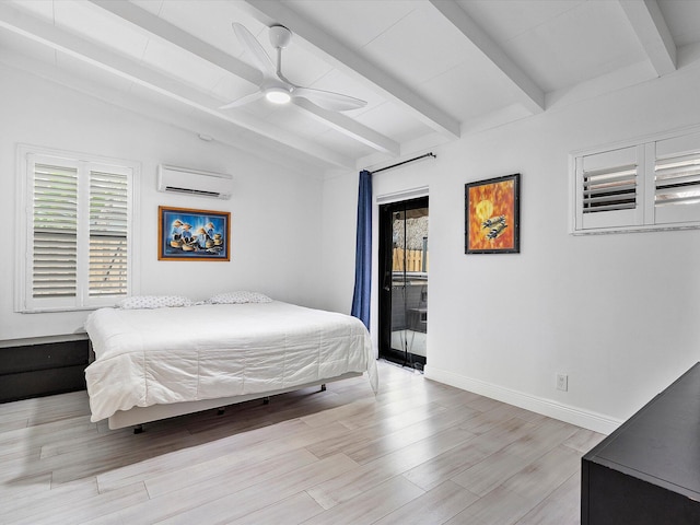 bedroom with a wall unit AC, lofted ceiling with beams, baseboards, light wood-style floors, and access to outside