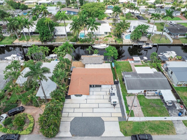 aerial view featuring a water view and a residential view