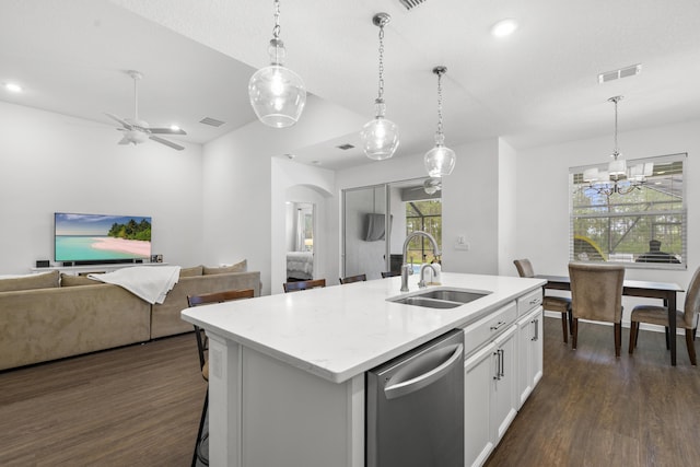 kitchen featuring dishwasher, a sink, dark wood-type flooring, white cabinetry, and a chandelier
