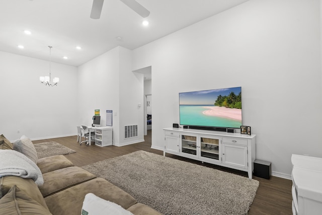 living area with a chandelier, baseboards, ceiling fan, dark wood-style floors, and recessed lighting
