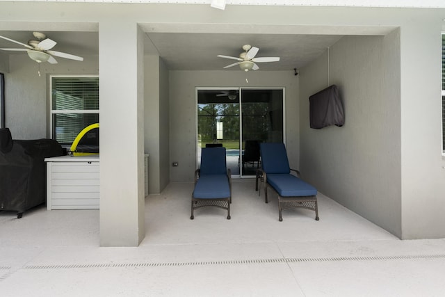 view of patio featuring a ceiling fan
