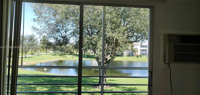 17 Brighton A 17, Boca Raton, FL 33434 - doorway to outside featuring a water view and plenty of natural light