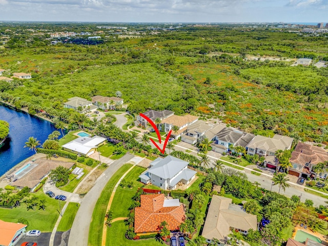 12952 Drayton Rd, North Palm Beach, FL 33408 - drone / aerial view featuring a water view and a residential view