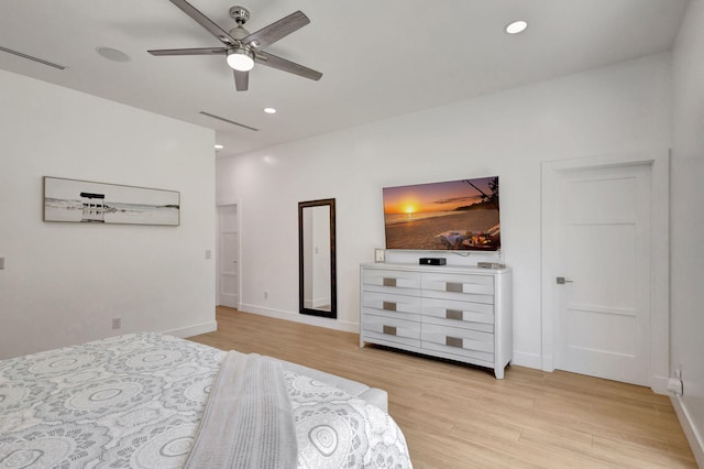 12952 Drayton Rd, North Palm Beach, FL 33408 - bedroom with baseboards, recessed lighting, and light wood-type flooring