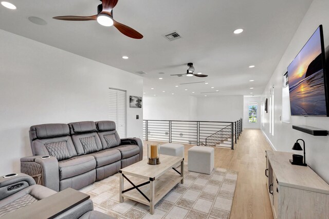 12952 Drayton Rd, North Palm Beach, FL 33408 - living area with light wood-type flooring, visible vents, a ceiling fan, and recessed lighting