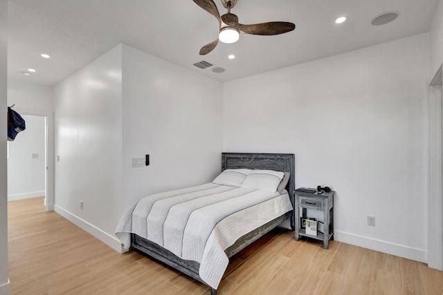 12952 Drayton Rd, North Palm Beach, FL 33408 - bedroom featuring light wood finished floors, baseboards, visible vents, and recessed lighting