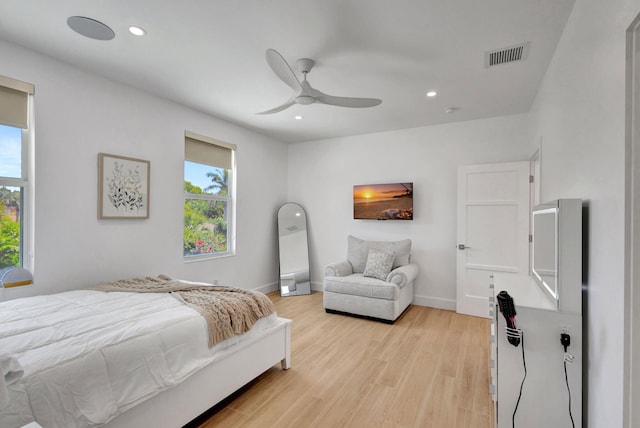 12952 Drayton Rd, North Palm Beach, FL 33408 - bedroom featuring light wood-style flooring, a ceiling fan, visible vents, baseboards, and recessed lighting
