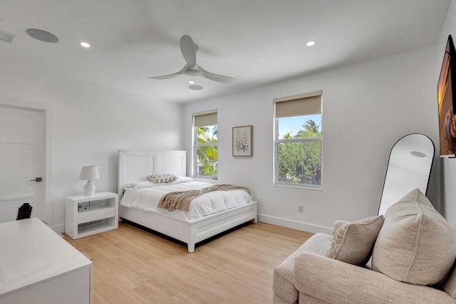 12952 Drayton Rd, North Palm Beach, FL 33408 - bedroom featuring light wood-type flooring, visible vents, recessed lighting, a ceiling fan, and baseboards
