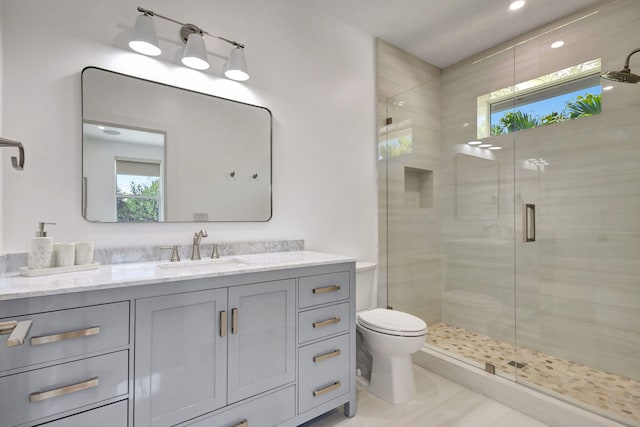 12952 Drayton Rd, North Palm Beach, FL 33408 - full bathroom featuring toilet, a shower stall, and a healthy amount of sunlight