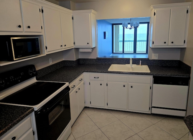 9940 S Ocean Dr Unit 1005, Jensen Beach, FL 34957 - kitchen featuring electric stove, white dishwasher, a sink, a chandelier, and white cabinets