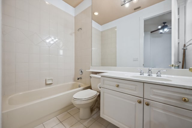 4065 Manchester Lake Dr, Lake Worth, FL 33449 - bathroom featuring tile patterned floors, washtub / shower combination, toilet, vanity, and ceiling fan