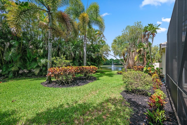 4065 Manchester Lake Dr, Lake Worth, FL 33449 - view of green lawn with a water view