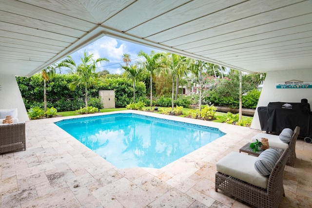 outdoor pool with a patio