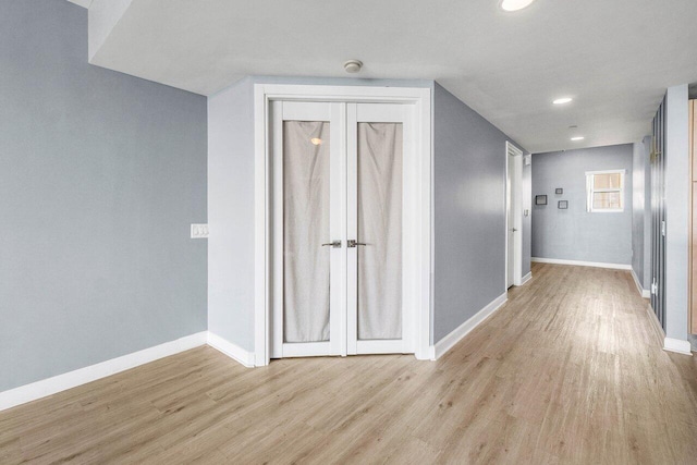 2640 Lake Shore Dr Unit 614, Riviera Beach, FL 33404 - hallway with light wood-style floors, baseboards, and recessed lighting
