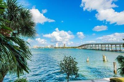 2640 Lake Shore Dr Unit 614, Riviera Beach, FL 33404 - water view featuring a notable bridge
