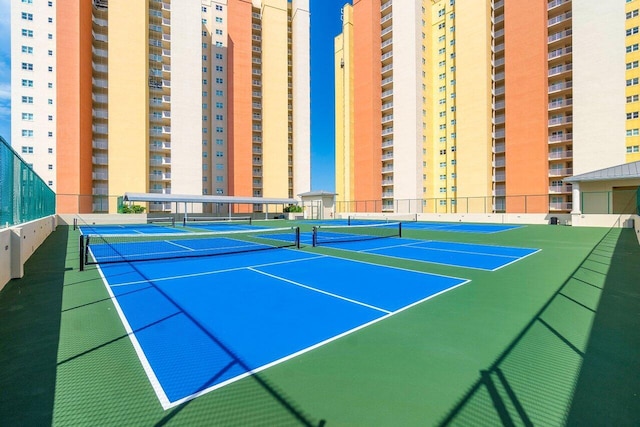 2640 Lake Shore Dr Unit 614, Riviera Beach, FL 33404 - view of tennis court featuring fence and community basketball court