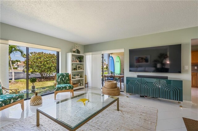 3215 S Lakeview Cir Unit 12104, Hutchinson Island, FL 34949 - sitting room featuring a textured ceiling