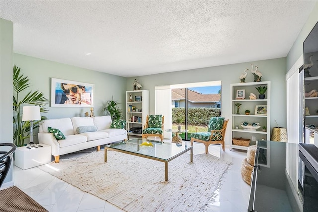 3215 S Lakeview Cir Unit 12104, Hutchinson Island, FL 34949 - living area with a textured ceiling and marble finish floors