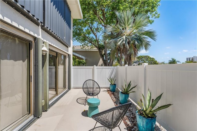 3215 S Lakeview Cir Unit 12104, Hutchinson Island, FL 34949 - view of patio with a fenced backyard