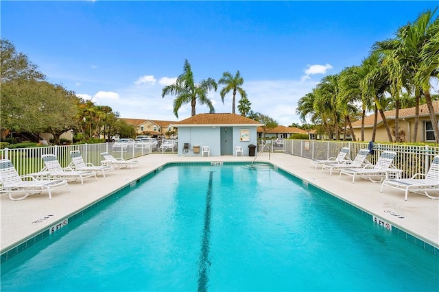 3215 S Lakeview Cir Unit 12104, Hutchinson Island, FL 34949 - community pool featuring fence and a patio area