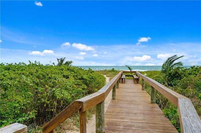 3215 S Lakeview Cir Unit 12104, Hutchinson Island, FL 34949 - dock featuring view of water and beach