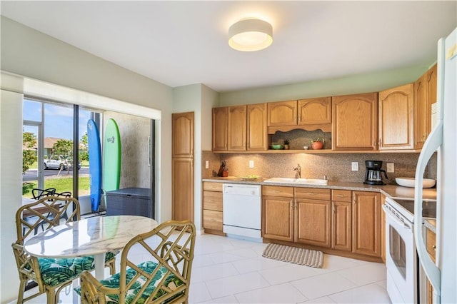 3215 S Lakeview Cir Unit 12104, Hutchinson Island, FL 34949 - kitchen featuring white appliances, a sink, decorative backsplash, open shelves, and light tile patterned flooring