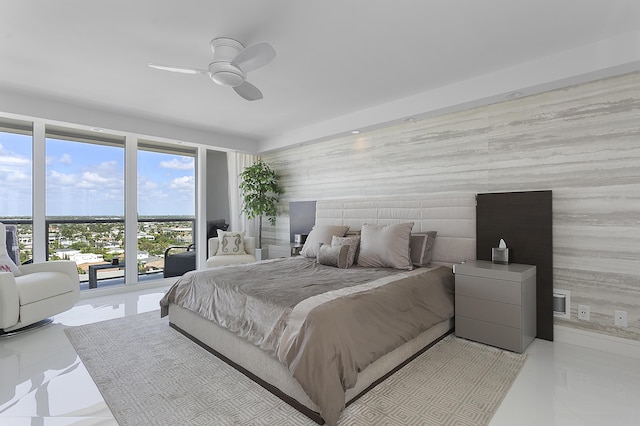 2800 S Ocean Blvd Unit 14A, Boca Raton, FL 33432 - bedroom with ceiling fan and an accent wall