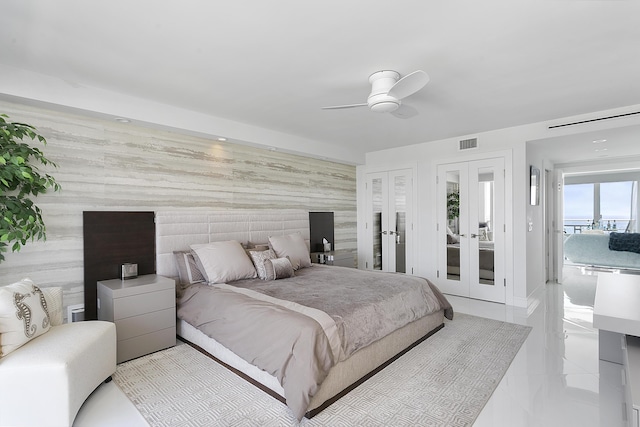 2800 S Ocean Blvd Unit 14A, Boca Raton, FL 33432 - bedroom with an accent wall, a ceiling fan, french doors, and visible vents